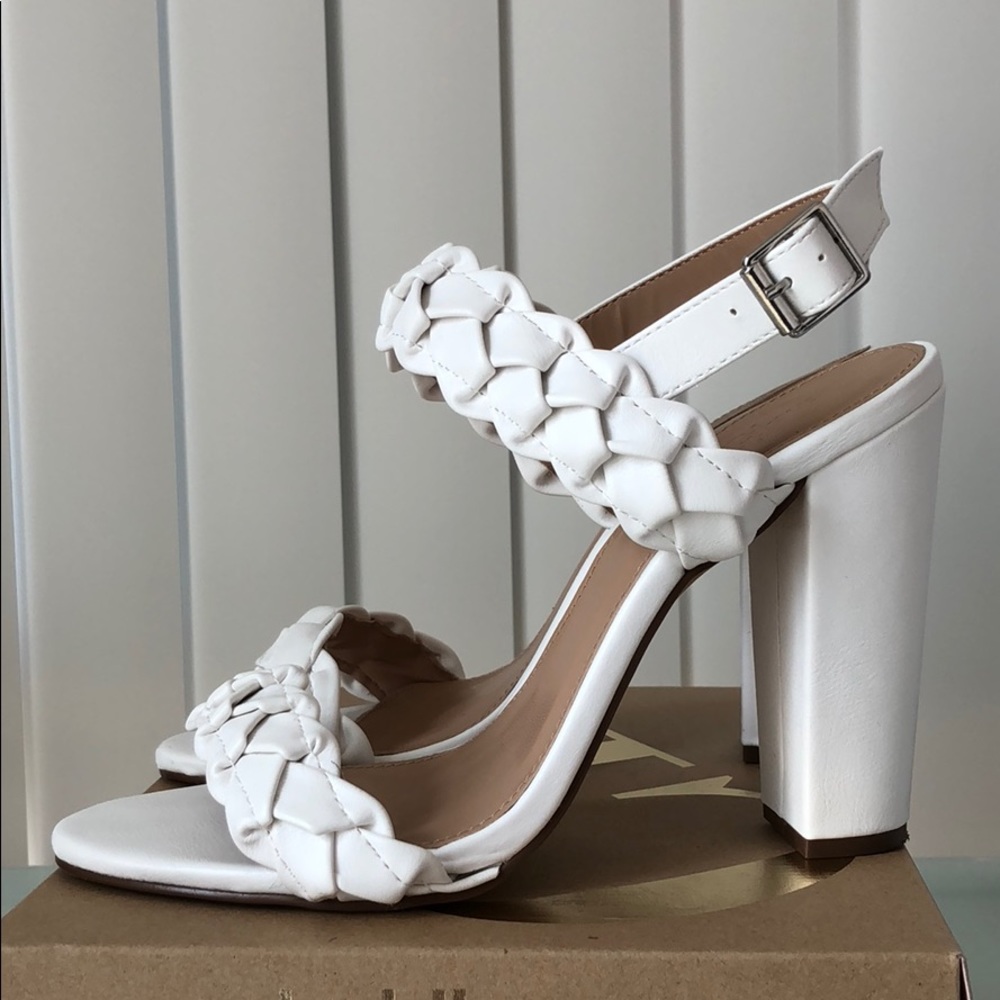 CR SANANI white high heels